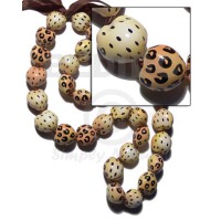 Kukui seeds in animal print