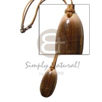 Green shell pendant on wax