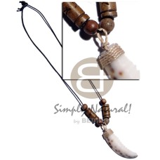 Cowrie tiger tooth pendant